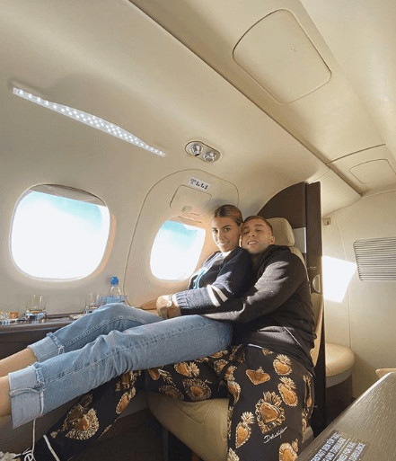 With His Girlfriend On A Plane